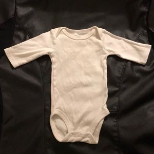 Precious Firsts solid white newborn onesie